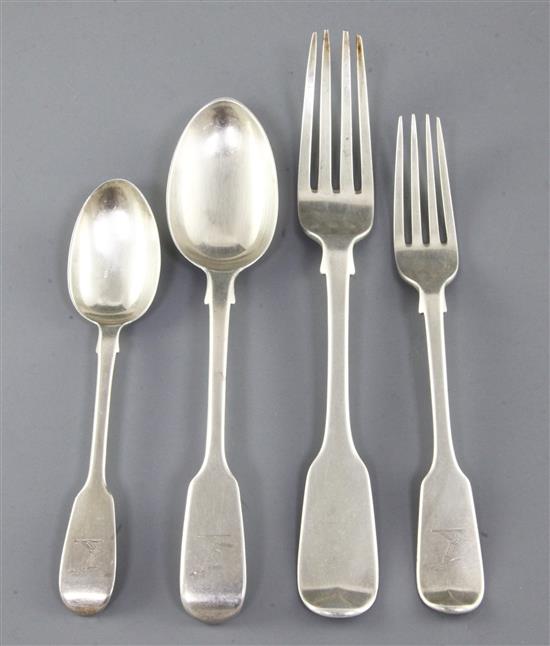 A matched part canteen of 19th century silver fiddle pattern flatware, 131 oz.